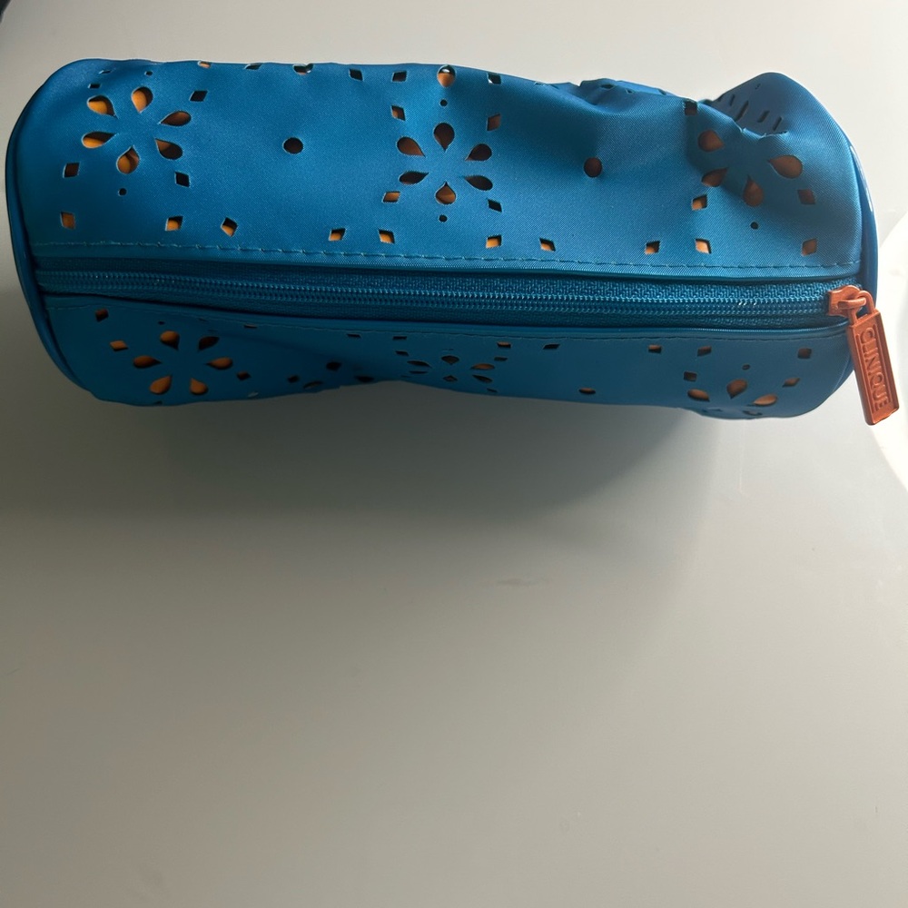 Clinique Blue Cosmetic Bag with Orange Accents